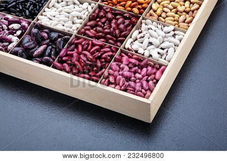 Different Types Of Legumes Beans. In Wooden Box.varieties Of Beans.top View.closeup.texture.copy Spa