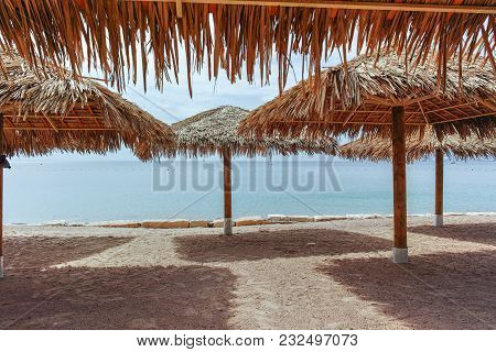 Beautiful Public Sandy Beaches On Red Sea In Eilat With Stro Umbrellas, Luxury Vacation Spa Resorts 