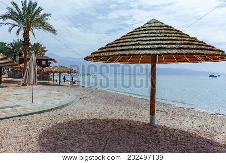 Beautiful Public Sandy Beaches On Red Sea In Eilat With Stro Umbrellas, Luxury Vacation Spa Resorts 