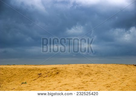 Sky And Sand At Azov Sea Beach Looking Like Ukrainian Flag, Arabat Spit, Ukraine