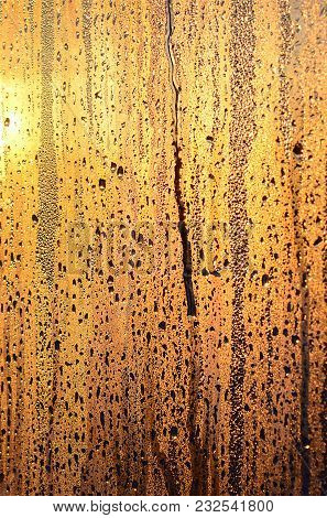 The Texture Of Misted Glass With A Lot Of Drops And Drips Of Condensation Against The Sunlight At Da