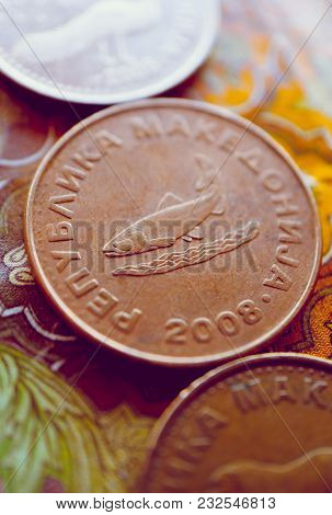 Macedonia Currency Denar On The Banknote Pattern Background, Close Up. Photo Depicts Macedonian Cash
