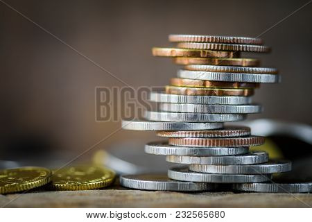 Closeup Strack Of Money Coins With Differrent Position Wording Bonus , Idea  For Money And Business 