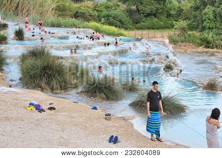Saturnia, Italy - May 3, 2015: People Visit Natural Hot Springs In Saturnia, Italy. Thermal Springs 