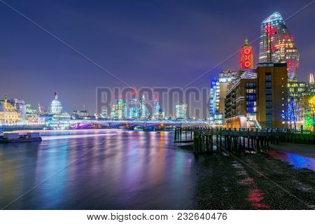 London, United Kingdom - January 17: This Is A Night View Of Modern City Buildings And The Famous Ox