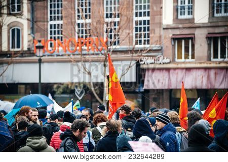 Strasbourg, France  - Mar 22, 2018: Crowd With Flags In Place Kleber At Demonstration Protest Agains