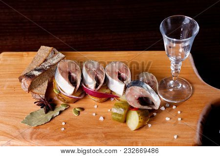 Pickled Herring With Chopped Onions And A Glass Of Vodka. Russian National Snack