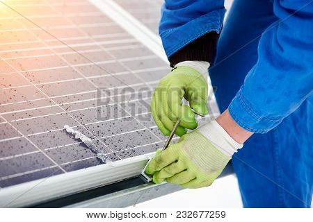 Cropped Shot Of A Professional Technician Wearing Protective Gloves Repairing Blue Solar Panel Outdo