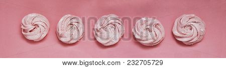 Pink Homemade Zephyr Or Marshmallow On Pink Background. Marshmallow, Meringue, Zephyr. Banner