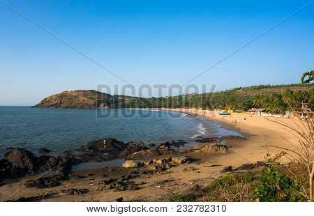 The Main Town Beach Of Gokarna, India, A Lot Of Yellow Sand And Few People, The Evening