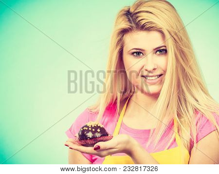 Diet, Sweets, Food Concept. Woman Holding Delicious Chocolate Cupcake With Peanut Frosting About To 