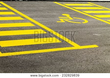 Reserved Yellow Parking Space For Disabled People