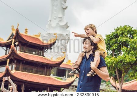 Happy Tourists Dad And Son In Pagoda. Travel To Asia Concept. Traveling With A Baby Concept.