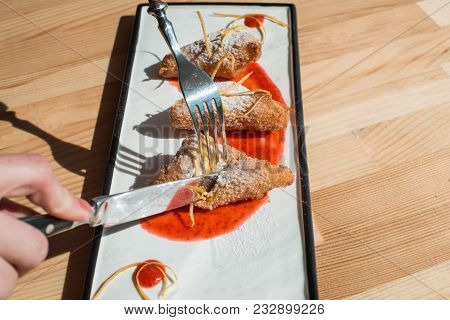 Womans Hands Slices Dessert Leche Frita , Decorated With Jam Close-up On A Plate. Spanish Cousine. W