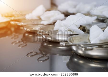 A Set Of Instruments For Gynecological Examination. Vaginal Speculum, Gauze Tampon And Surgical Clam