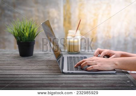 Typing Keyborad Of Laptop On The Table
