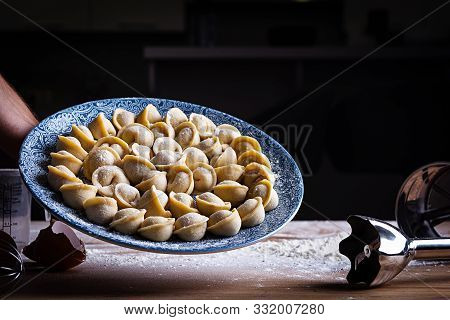 Homemade Dumplings, Pelmeni, Ravioli. Raw Russian Pelmeni.