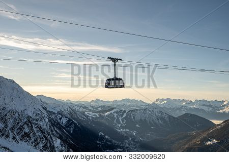 Chamonix, France - December 26,2018: Telepherique Cable Car In The Air On The Way Up To Aiguille Du 