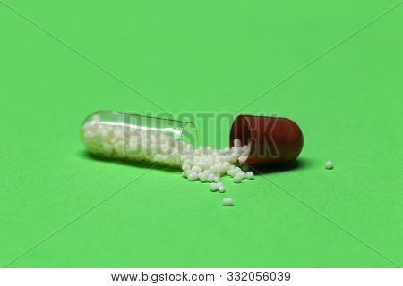 Hard-shelled Capsules, Which Contain Dry, Powdered Ingredients Or Miniature Pellets