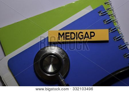 Medigap Write On Sticky Note. Medical Or Healthcare Concept