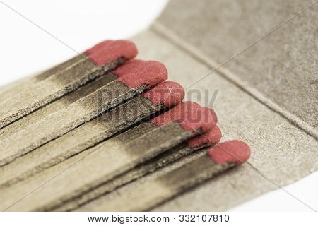 A Macro Shot Of An Open And Partially Used Generic Matchbook.