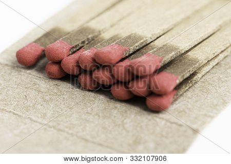 A Macro Shot Of An Open And Partially Used Matchbook.