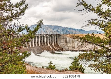 Dam At Jackson Lake In Early September.  Snow Can Be Seen In The Mountains.