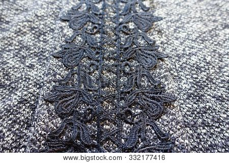 Thick Grey Melange Woolen Fabric With Vertical Stripe Of Black Lace