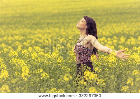 Happy Beautiful Woman In Free Summer Love Of Youth Wellbeing. Attractive Young Beauty Girl Enjoying 