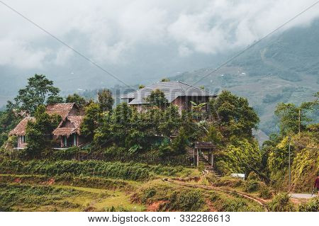 Houses And Homes On Top Of Rice Terraces Outside The Beautiful Village Of Sapa In Northern Vietnam, 
