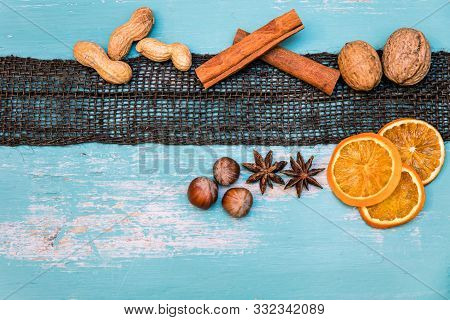 Flatlay, Winter Spices For Mulled Wine Or Gingerbread On Blue Shabby Chic Table, Copyspace