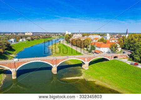 Croatia, Town Of Sisak, Aerial View From Drone Of The Old Town Center And Bridge Over Kupa River