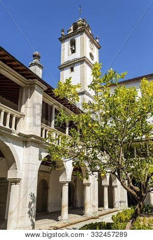 Lorvao, Portugal - August 21, 2019: Detail Of The Renaissance Cloister, With Roman Arches, Doric Col