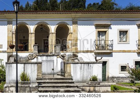 Facade Of The Former Priests House Located In The Front Garden Of The Monastery Of Saint Mary Of Lor