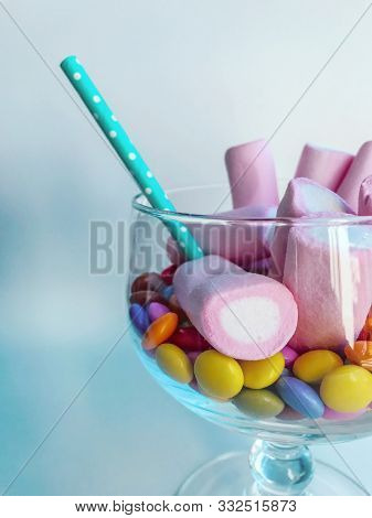 Delicious Marshmallows And Sweet Small Candies In A Glass Bowl