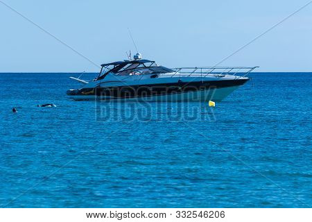 Paguera, Mallorca, Spain - Mai 31, 2016:
View Of The Bay Of Paguera With Pleasure Boat In Azure Wate