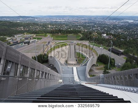 Panoramic View Of European City Of Oslo Seen From Ski Jump In Holmenkollen District In Norway With C