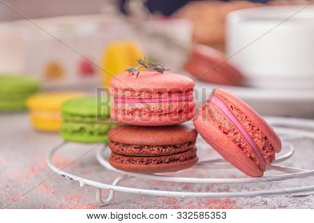 Colorful Macarons Over On Grey Background.