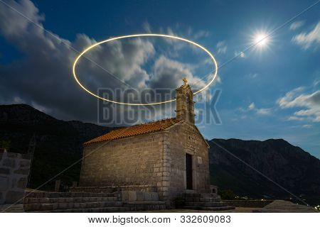 Saint Sava Church On Island Of Sveti Stefan With Light-drawn Circle At Long Exposure