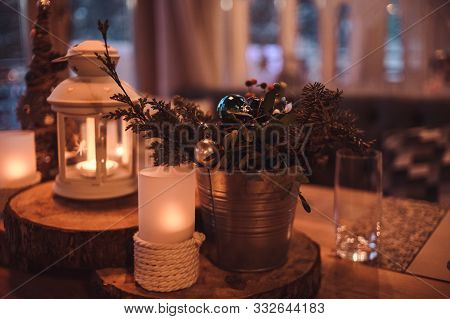 Christmas Or New Year Party Table. Toned Image.the Concept Of A Festive Dinner.festive Branch Decora
