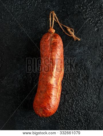 Traditional Balearic Raw Cured Meat Sobrassada Sausage Made From Ground Pork, Paprika And Spices On 