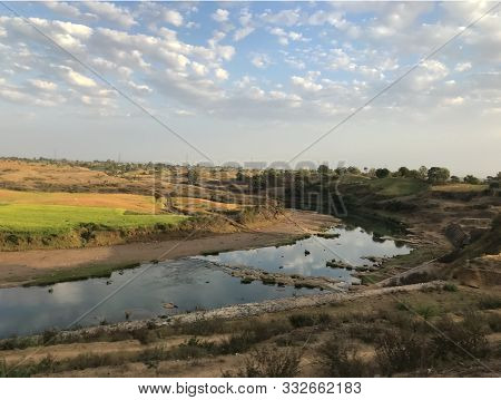 Landscape Of River In Cloudy Days - A View Of Narmada River Taken From Train Window