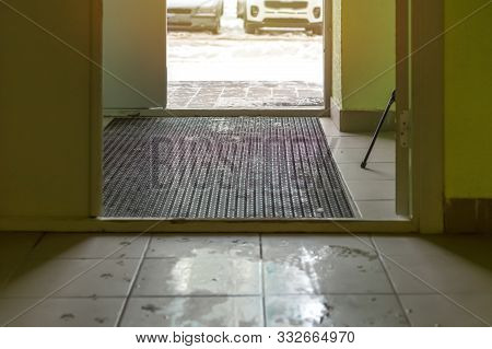 Wet And Muddy In The Stairwell, Slush In Winter Or Spring, Exit To The Street