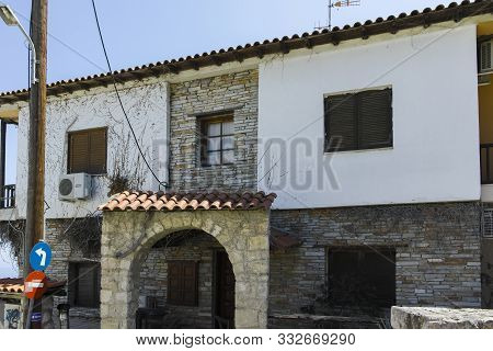 Afytos, Kassandra,  Greece - March 31, 2019: Old Houses And Streets In The Historical Town Of Afytos