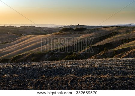 Landscape Of The Siena Hills At Sunset