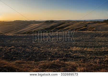 Landscape Of The Siena Hills At Sunset