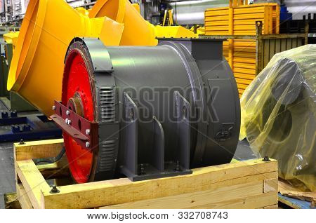 Synchronous Traction Generator With A Cylindrical Rotor In The Production Hall Of An Automobile Plan