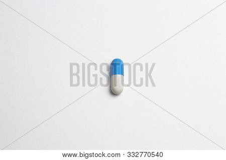 Pharmaceutical Medicine Pills, Tablets And Capsules On White Background. Top View. Flat Lay. Copy Sp