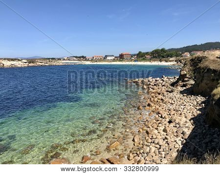 View Of The Ocean From Above The Rocks In Sanxenxo Galicia Spain During A Summer Day