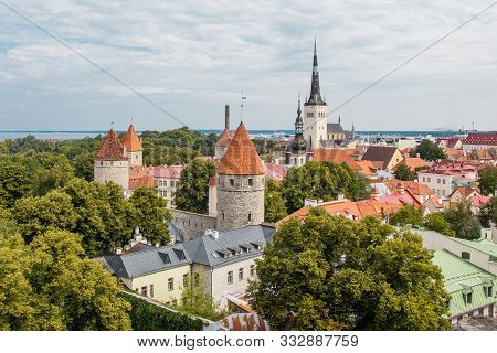 Top View On The Orange Roofs And Spiers Of The Old City. Tallinn, Estonia